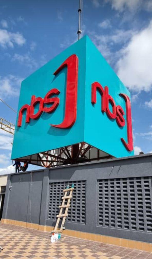 NBS Television — rooftop cube signage